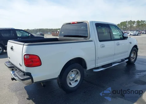 2003 Ford F150 Supercrew из США, поврежденный, VIN 1FTRW076X3KC00022